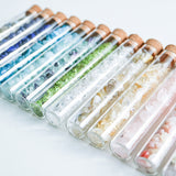Gemstone chips  in a test tube