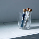 Gemstone chips  in a test tube