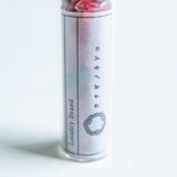 Gemstone chips  in a test tube
