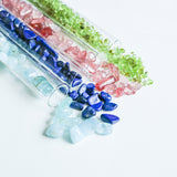 Gemstone chips  in a test tube