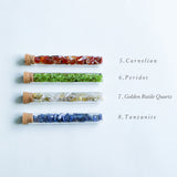 Gemstone chips  in a test tube
